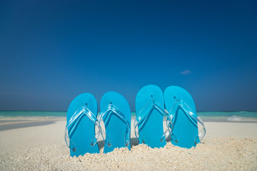 flip flops on a tropical beach