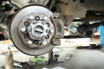 Front disc brake repairing in garage