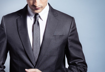 Man wearing suit.