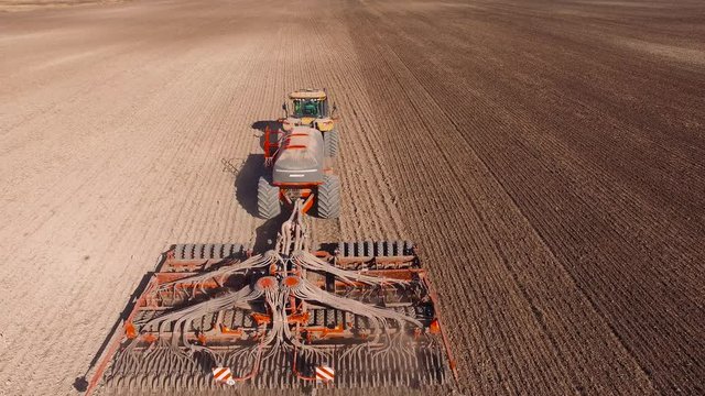Tractor plowing - aerial shot