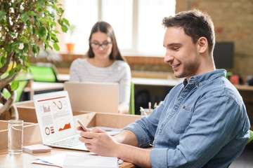 Nice colleagues working in the office  