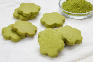 Homemade matcha green tea shortbread cookies on parchment
