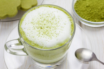 Matcha gren tea latte in glass cup