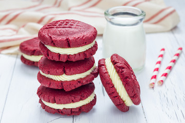 Red velvet sandwich cookies with cream cheese filling