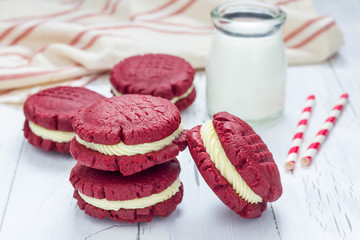 Red velvet sandwich cookies with cream cheese filling