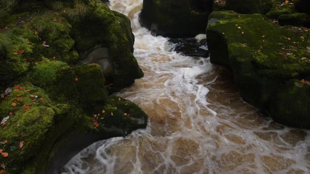 
Tilt shot of a river packing in a narrow chasm called the Strid in Yorkshire dales national park.
