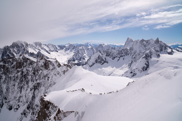 Fototapeta na wymiar The view from the observation deck of the top of Aiguille du Mid