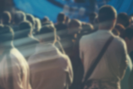 Blur Unrecognizable Young Crowd At Political Meeting, Cheering A