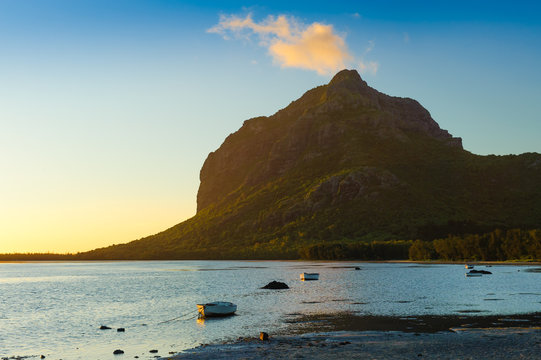 Magnificent views of Le Morne Brabant mountain at sunset. Mauritius Island