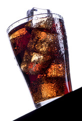Fototapeta na wymiar Cold refreshing soft drink with ice