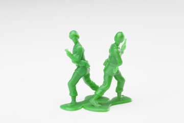 two green toy soldiers