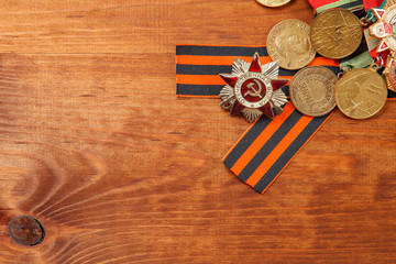 George's Ribbon and Medals for the victory over Germany on a wooden