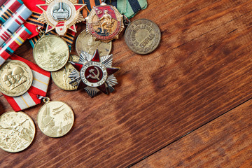Order of the Patriotic War in St. and Medals for the victory over Germany on a wooden. close up