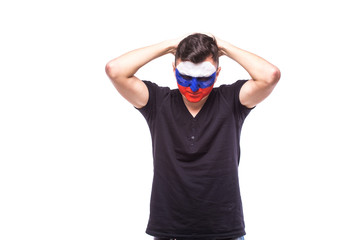 Unhappy and Failure of goal or lose game emotions of  Russian football fan in game supporting of Russia national team on white background. European football fans concept.