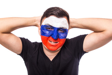 lose game emotions of  Russian football fan in game supporting of Russia national team on white background. European football fans concept.
