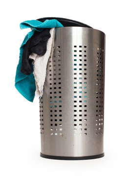 Dirty laundry in a metal basket