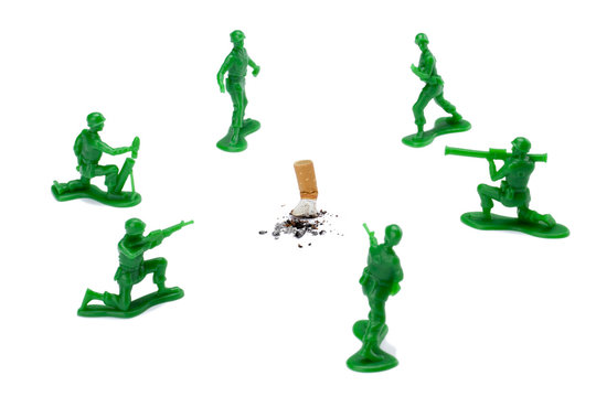 soldiers surrounding a cigarette butt