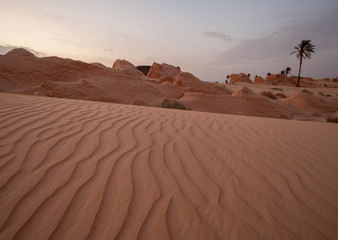 Fototapeta na wymiar Beautiful yellow sunset or sunrise at early morning in the Sahara Desert, Merzouga, Morocco