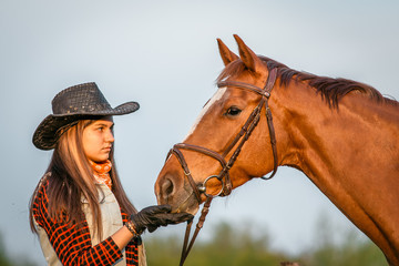 Fototapeta premium cowgirl and horse
