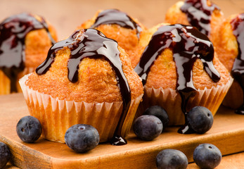 baked muffins covered chocolate