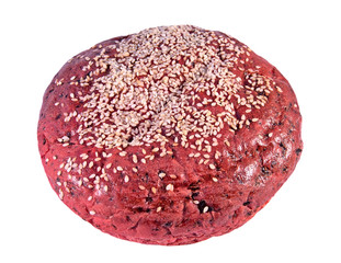 Beetroot bread with sesame seeds isolated on a white background