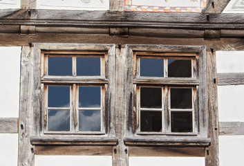 two windows in an old half timbered house