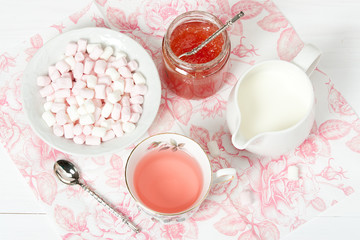 Fototapeta na wymiar Watermelon Jam, Herbal Tea, Marshmallows. White Wooden Table