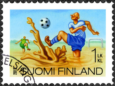 FINLAND - 2013: shows swamp football, series Finnish Oddity