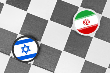 Draughts (Checkers) - Israel vs Iran. Conflict between rivals in the middle east territory and threat of using nuclear weapons.