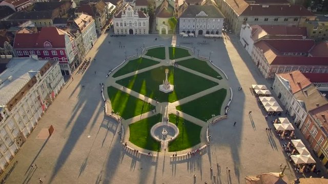 Drone flying over Union Square in Timisoara where sunset creates beautiful shadows
