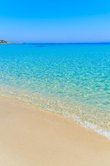 Fototapeta na wymiar Sea wave on sandy idyllic Bodri beach, Corsica island, France