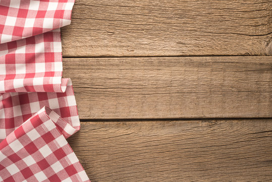   Tablecloth textile on wooden background 