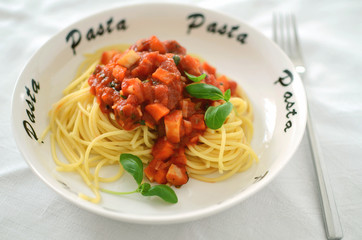 Spaghetti napoli with tomato sauce and vegetables