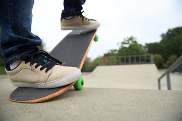 skateboarding woman at skatepark