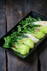 Cooked bok choy with sesame seeds