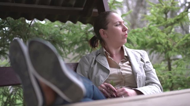 Woman relaxes in the park