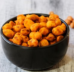 Masala coated peanuts, selective focus