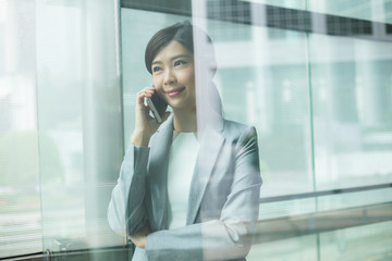Business woman speaking on cell phone