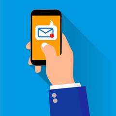 Smart phone in hand with message