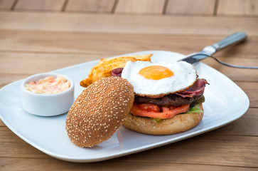 Hamburger with fried eggs
