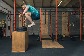 Male Crossfit Trainer Jumping