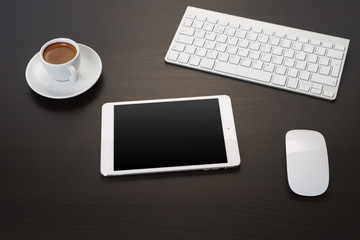 Digital tablet on office table.