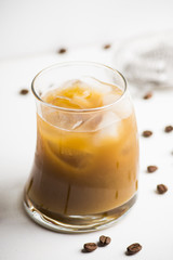 White russian cocktail on the wooden background