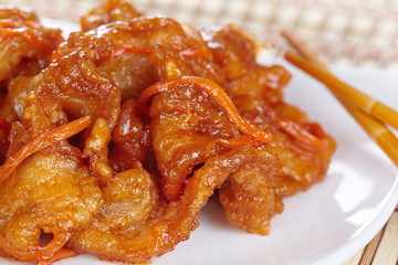 Chinese cuisine. Pork in batter and sweet and sour sauce
