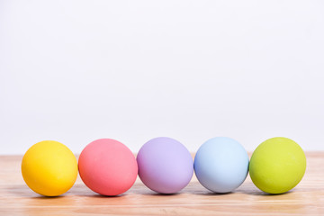 Easter eggs on wood floor