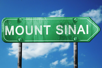 mount sinai road sign, vintage green with clouds background