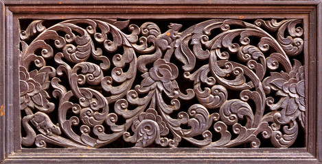 Abstract background texture of ancient wood carving.