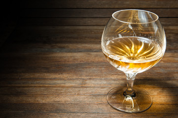 Whisky on wooden table