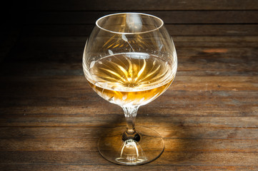 Whisky on wooden table