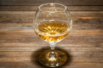 Whisky on wooden table